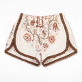 Shorts Cannella DELAMIA — ricamo nei toni ruggine e terracotta su lino écru, vista frontale