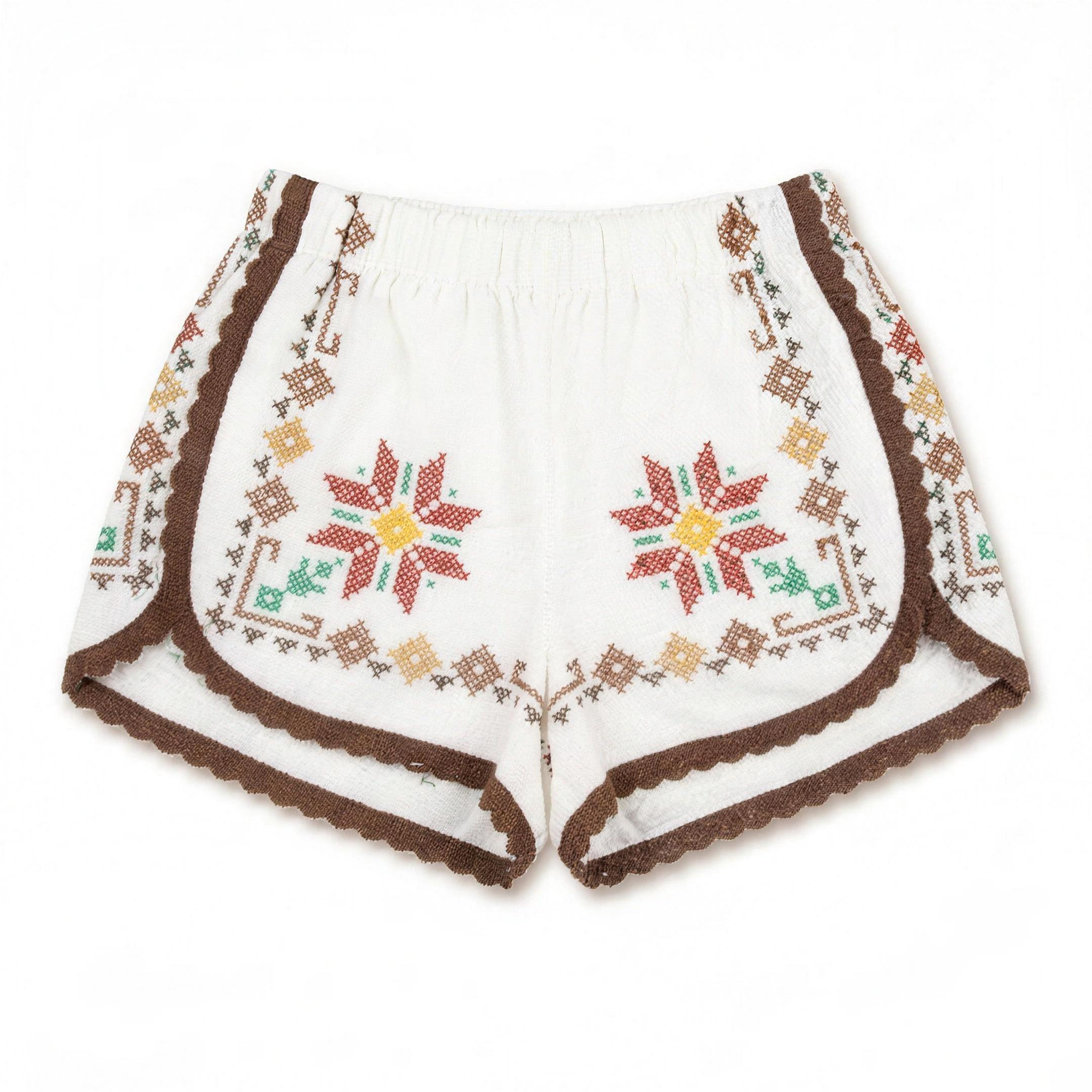 Shorts Luminaria II DELAMIA — ricamo folk multicolore con bordo marrone, vista frontale