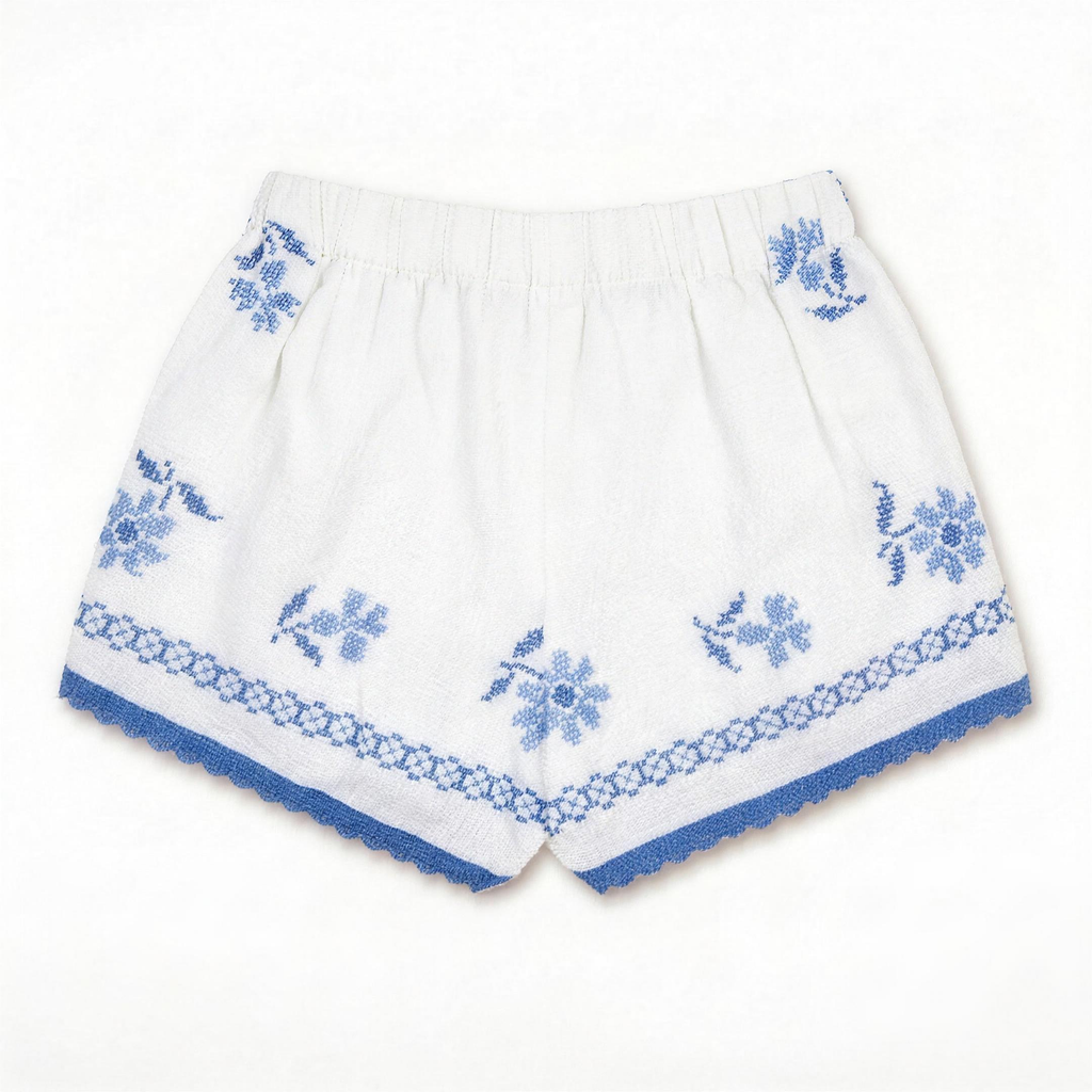 Shorts Verzura III DELAMIA — vista posteriore con foglie verdi e fiori