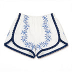 Shorts Indaco DELAMIA — tralci floreali blu navy su lino avorio, vista frontale