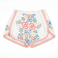 Shorts Rosalia DELAMIA — bouquet floreale corallo e rosa su lino avorio, vista frontale