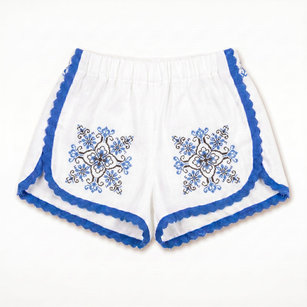 Shorts Stella DELAMIA — rosoni a stella blu fiordaliso su lino avorio, vista frontale