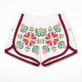 Shorts Luminaria DELAMIA — ricamo folk multicolore con bordo vinaccia, vista frontale