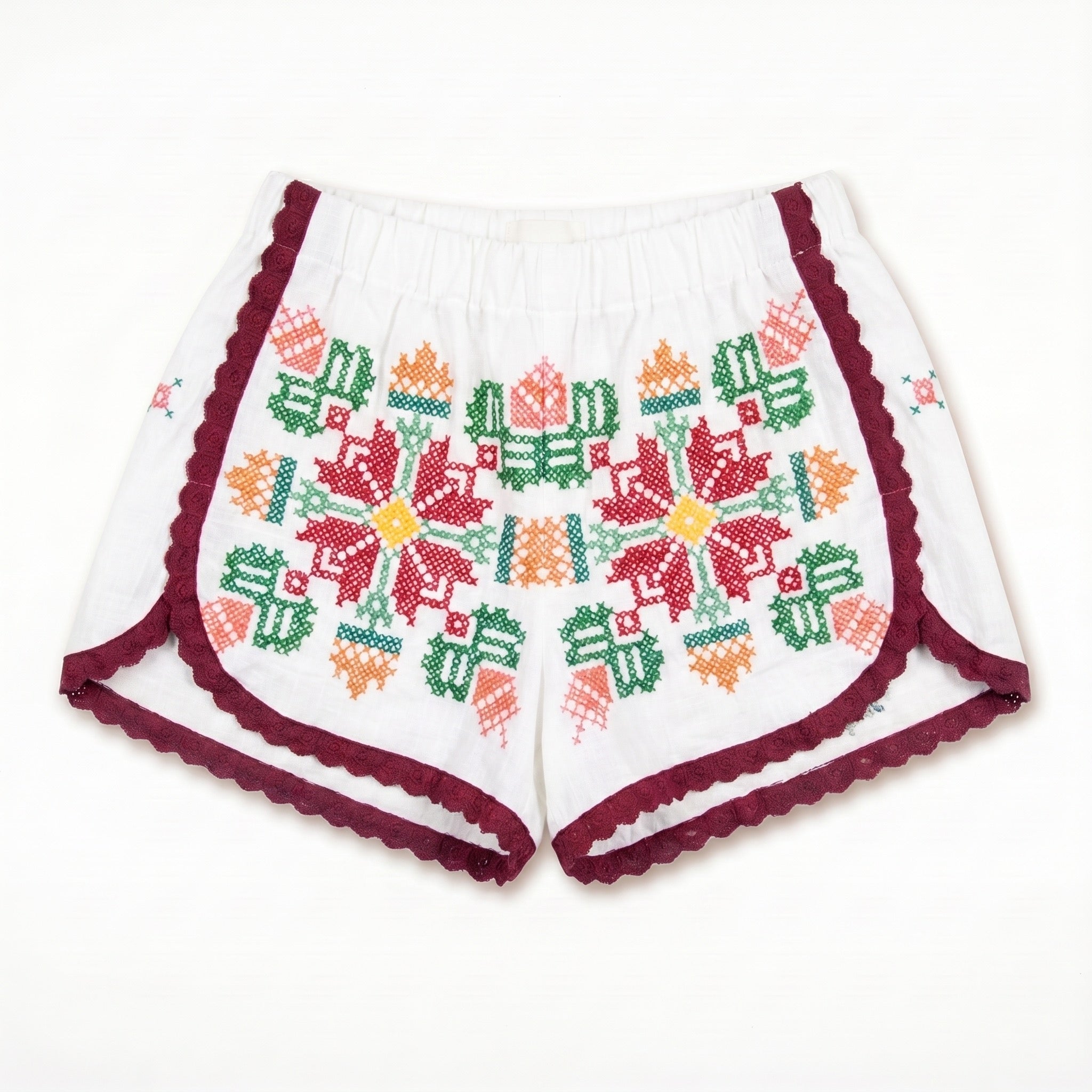 Shorts Tarantella DELAMIA — ricamo folk multicolore con bordo vinaccia, vista frontale